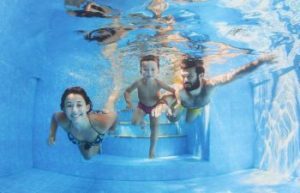 Family in Swimming Pool Miami FL
