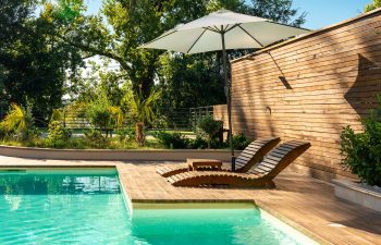 private outdoor swimmin pool with wooden decking